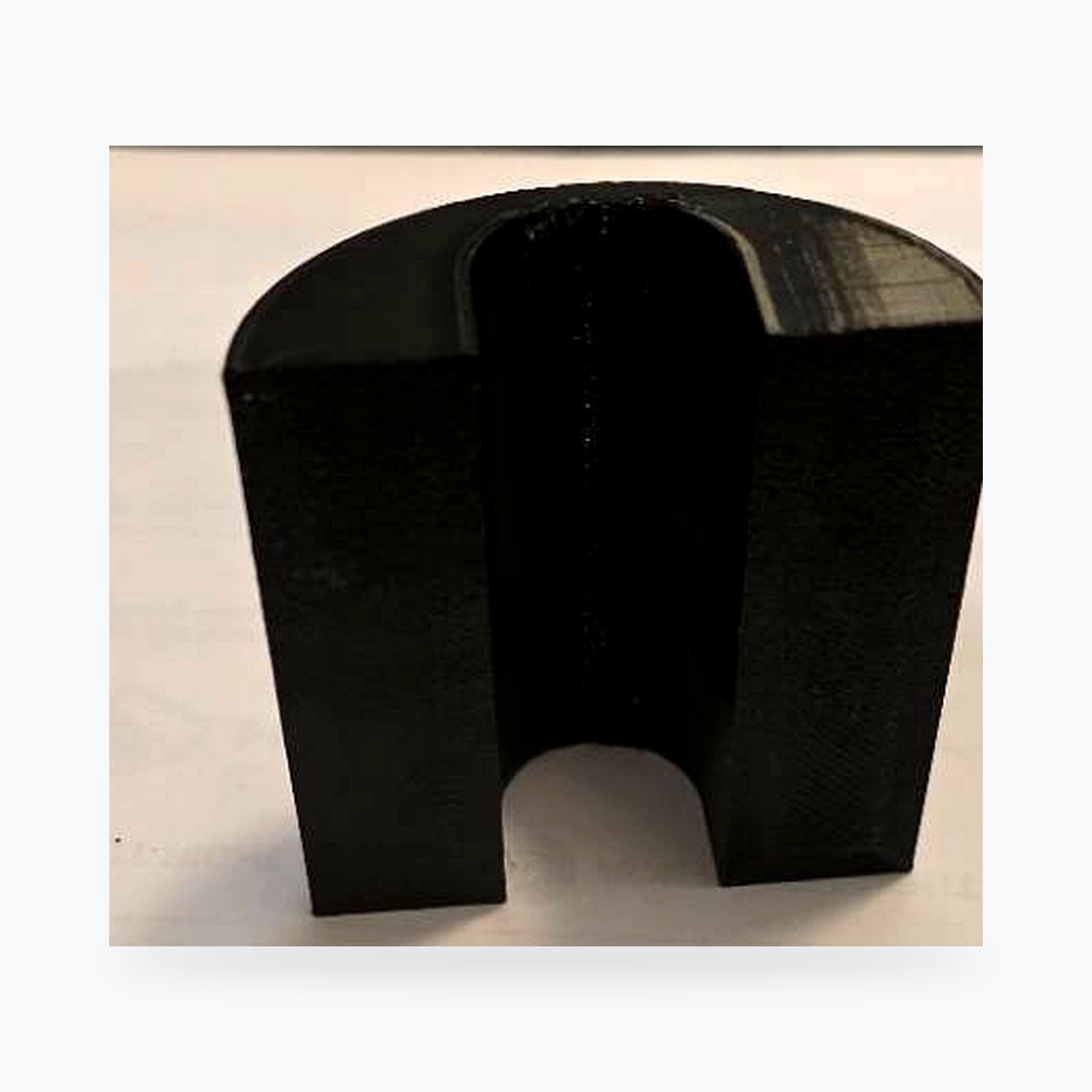 Clean catalog rear view of the current EVCD Arc Solo showing the open channel